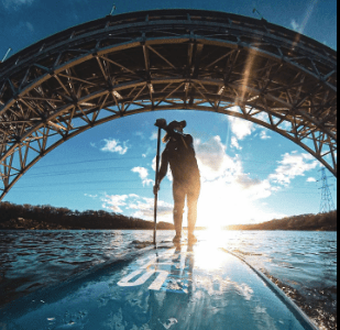 Woman paddling with outdoor lifestyle