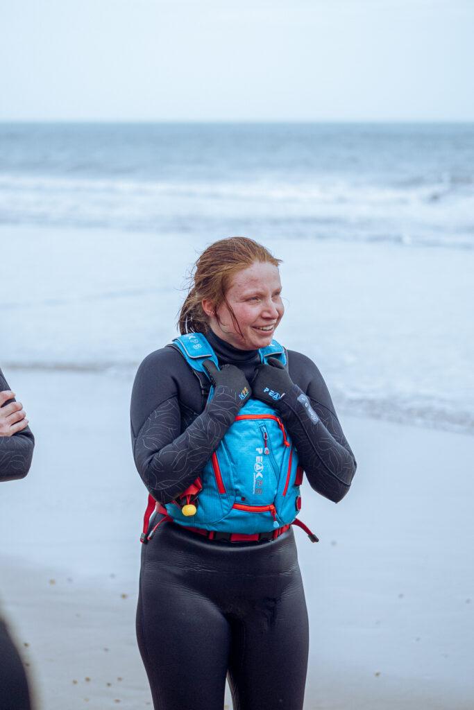 Outdoor Instructor in a wetsuit and buoyancy aid